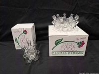 Both boxed units and one unboxed arranger displayed