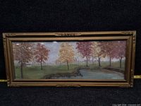 Full view of framed painting showing artwork and frame