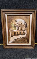 Front view of framed oil painting