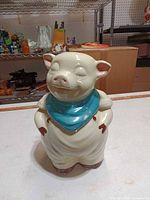 Front view of Shawnee Smiley Pig cookie jar with lid in place