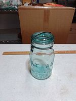 Full view of jar front showing ATLAS E-Z SEAL embossing and bail wire