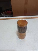 closed wooden organizer cylinder