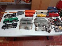 Overview showing locomotives, freight cars and bundled track