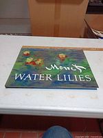 Front cover of Monet Water Lilies hardcover book