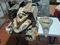 Crawler launch complex holding shuttle orbiter with Phantom X-19 beside