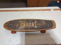 Top view showing worn grip surface with BANZAI stencil