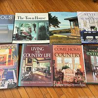 Group shot showing all eight books