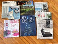 Group shot of all seven hardcover books showing covers