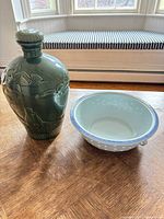 Jug and bowl side by side showing relative sizes and designs