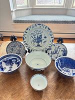 group shot of the four Jingdezhen porcelain pieces