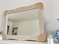 Front view of rectangular wicker rattan framed mirror