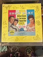 Box cover displaying Show Boat title, cast names, MGM logo