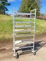 Full view of aluminum baker's rack with two plywood boards installed