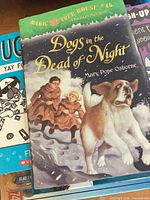 Front cover of Magic Tree House Dogs in the Dead of Night