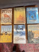 Group shot of all six fantasy novels