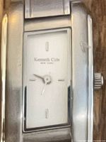 Kenneth Cole watch face close-up