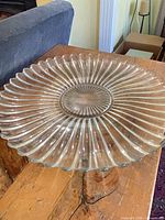 Full view of large clear glass platter on table