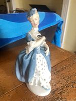 Front three-quarter view of figurine