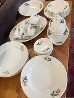 Overview of entire partial dinner service on table