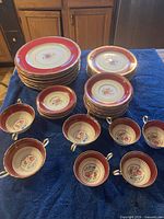 Stacked view of entire 44-piece Aynsley Hatfield china set