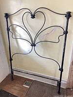 Full view of headboard showing scrollwork