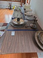 Full view of tabletop with laminate finish and folding legs visible beneath