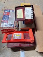 Stacked lot showing Stanley panel carry, GC Electronics kit, T-S-P cleaner and other items