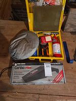 Overview of emergency kit case, sun shade, CarVac box