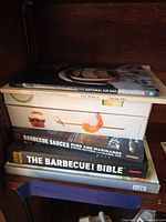 Stack of five books showing all titles