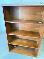 Front view showing shelves and finish