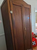 Closed armoire showing exterior finish and hardware