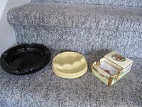 All ashtrays: brown glass, yellow ceramic, boxed china set with lid