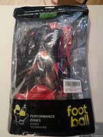 Front of sealed package showing gloves