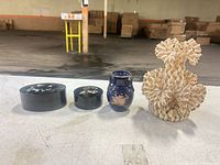 group view of both boxes, blue vase and shell dog