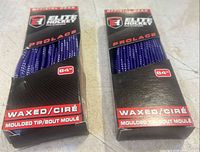 Two boxed Elite Hockey Prolace 84 in waxed purple laces front view