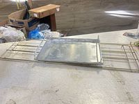 Tray and frame folded flat