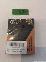 Front of sealed retail box showing product image, brand Gifts Ideas Great, 8-in-1 label