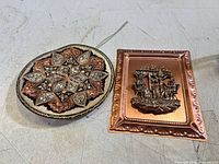 Both plaques side by side showing size and design