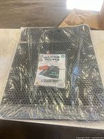 Sealed iPrimio cat litter mat in packaging full view