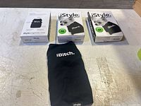 Three boxed iStyle Originals dog shirts and one unboxed shirt displayed