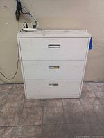 Full front view of 3-drawer metal lateral filing cabinet