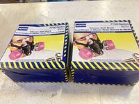 Two North 7700 Series respirator boxes front view