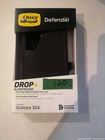 Front view of unopened OtterBox Defender Series box displaying case and branding