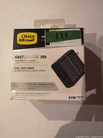 Front of OtterBox FastCharge 50 W dual-port wall charger box