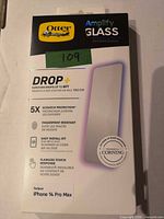 Front of sealed OtterBox Amplify Glass retail box