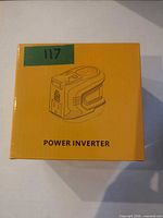 Sealed box front with line drawing of inverter