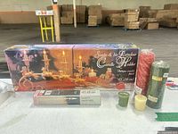 Boxed Santa & Reindeer candle holder with candles and matches