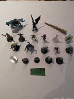 Group shot of all 19 miniatures on tabletop