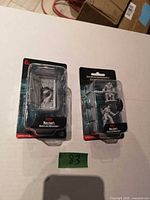 Both sealed blister packs on table