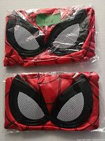 Two packaged Spider-Man masks front view